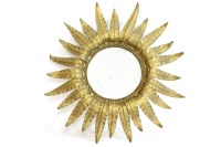 Lot 542 - A metal Sunburst mirror