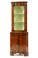 Lot 504 - Mahogany serpentine front part glazed corner cupboard