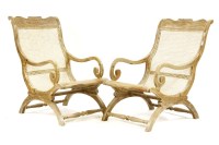 Lot 394 - Two 20th century hardwood framed steamer chairs