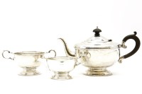 Lot 148 - A silver three piece teaset