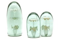 Lot 169 - Three Victorian green glass dump weights