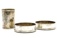 Lot 147 - A pair of modern silver wine bottle coasters