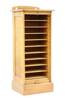 Lot 452 - An early 20th century oak office filing cabinet