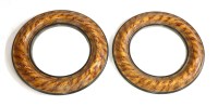 Lot 624 - A pair of faux tortoiseshell mirrors