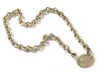 Lot 1504 - A ladies' Tiffany & Co. sterling silver oval tag necklace