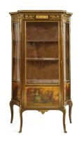 Lot 297 - A Continental serpentine mahogany vitrine