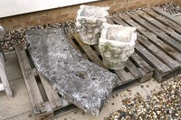 Lot 656 - A carved stone bench