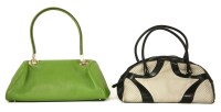 Lot 1164 - A Prada cream and black leather bowling handbag