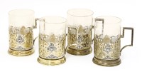 Lot 144 - Four gilt white metal cup holders