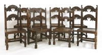 Lot 418 - A harlequin set of eight oak carved dining chairs