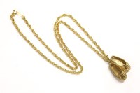 Lot 54 - A pendant in the form of ballerina style pumps