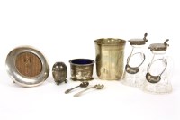 Lot 69 - A pair of silver topped oil and vinegars with silver labels