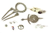 Lot 85 - A silver clan crest kilt pin modelled as sword and shield