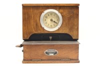 Lot 260 - A clocking in clock