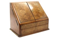 Lot 272 - A Victorian oak slope front stationary cabinet