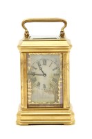 Lot 128 - A miniature carriage clock