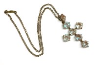 Lot 22 - A saphiret glass paste stone cross