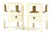 Lot 425 - A pair of marble-topped bedside tables (2)