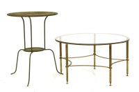 Lot 406 - A circular brass and glass topped occasional table