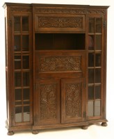 Lot 352 - An early 20th century oak billiard room cabinet