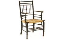Lot 388 - A William Morris style Sussex elbow chair