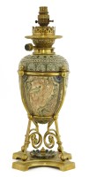 Lot 40 - A Doulton Lambeth stoneware oil lamp