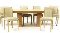 Lot 442 - An Art Deco bird's eye maple dining table