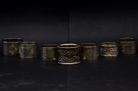 Lot 192 - Seven silver napkin rings