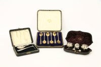 Lot 227 - A cased silver cruet set