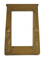 Lot 8 - An Art Nouveau copper framed mirror