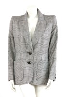 Lot 1355 - A vintage Yves Saint Laurent dog-toothed patterned jacket