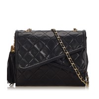 Lot 1053 - A Chanel matelassé tassel double flap shoulder bag