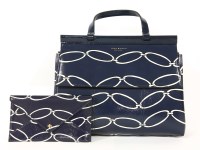 Lot 1117 - A Tory Burch T-printed 'Elliptical Link' handbag