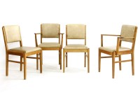 Lot 489 - A Gordon Russell teak extending dining table and four chairs