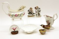 Lot 359 - A 18th century creamware shell moulded cream jug