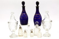 Lot 272 - A pair of George III style cut glass lidded urns