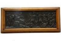 Lot 533 - An oak framed metal plaque