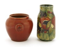 Lot 98 - A Moorcroft 'Pomegranate and Berry' vase