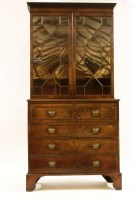 Lot 582 - A George III mahogany secretaire bookcase