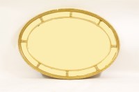 Lot 558 - An oval gilt wall mirror