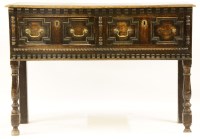 Lot 623 - An oak two drawer sideboard