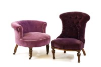 Lot 596 - Two Victorian purple upholstered chairs