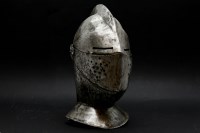Lot 445 - A theatrical armour helmet with two part visor