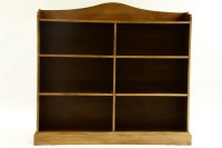 Lot 568 - A modern walnut open bookcase