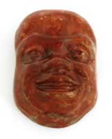 Lot 105 - A rare Moorcroft flambé mask