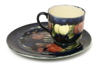 Lot 107 - A Moorcroft 'Wisteria' tennis set