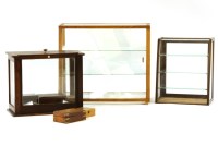 Lot 490 - Three triple top display cabinets and contents