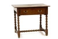 Lot 561 - An 18th century oak side table