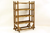 Lot 563 - A Colonial softwood open shelf