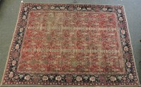 Lot 613 - A large Persian carpet